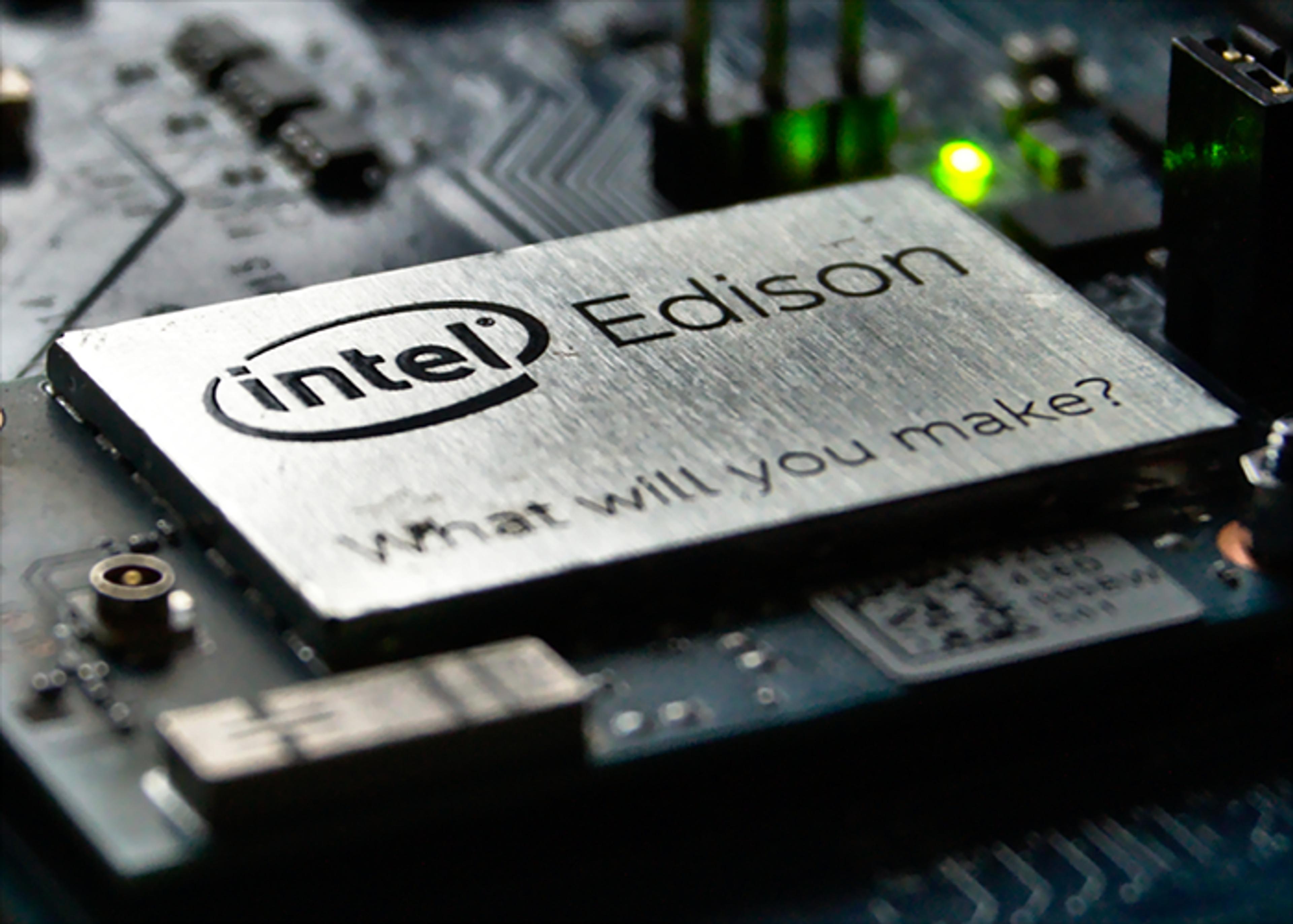 Close-up of an Intel Edison chip on a circuit board, displaying the Intel logo, the word "Edison", and the phrase "What will you make?".