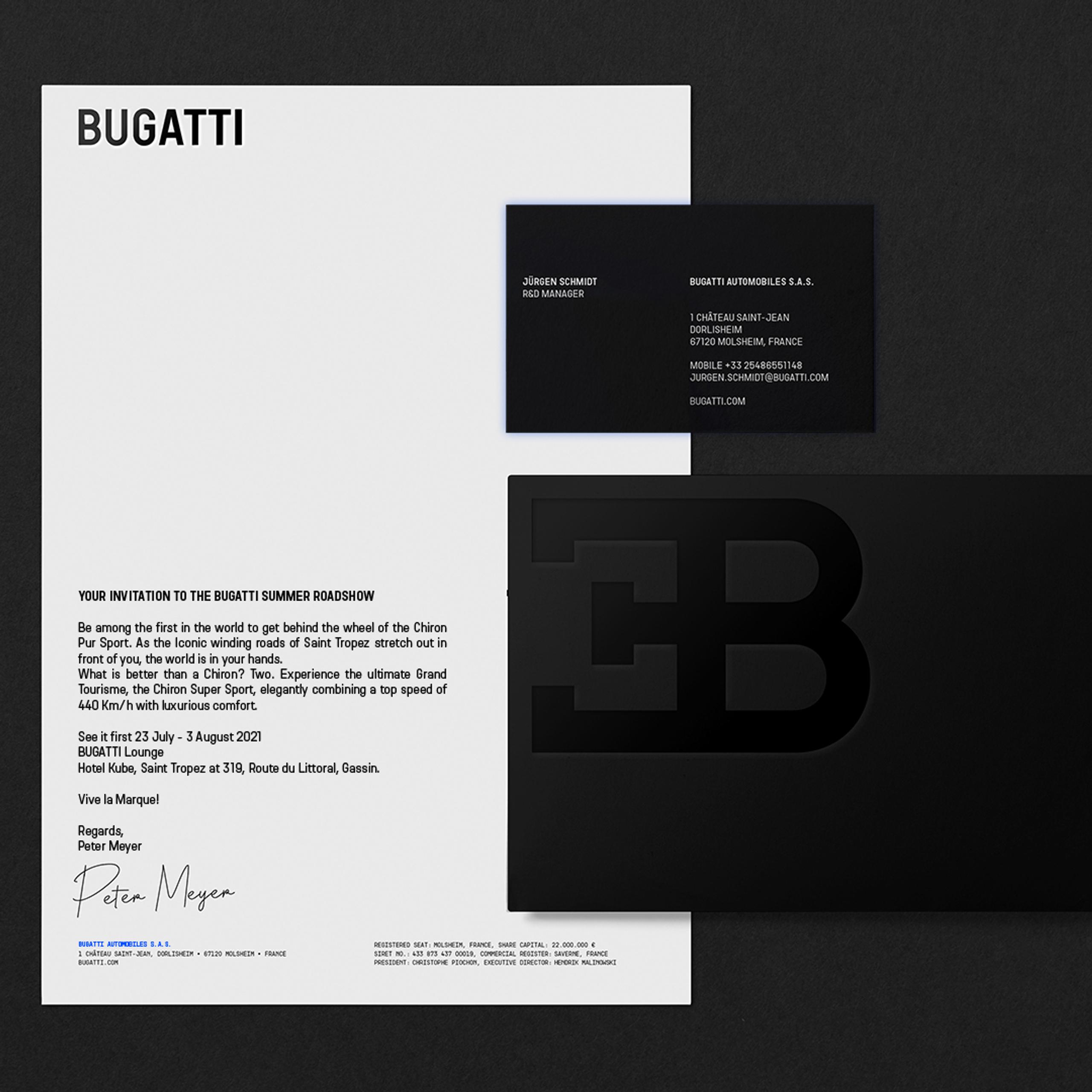 Bugatti invitation to summer roadshow with business cards, featuring company logo.