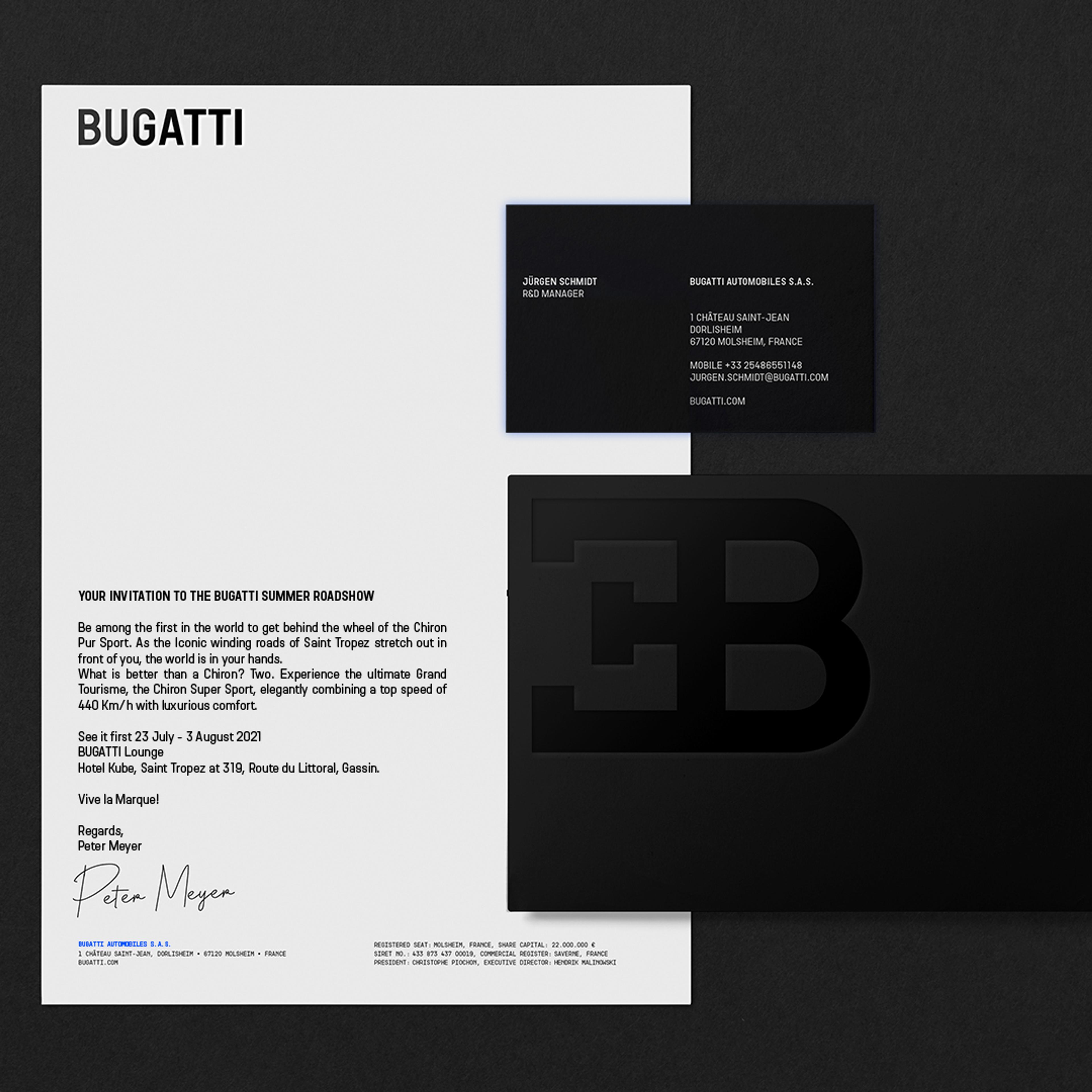 Bugatti invitation to summer roadshow with business cards, featuring company logo.