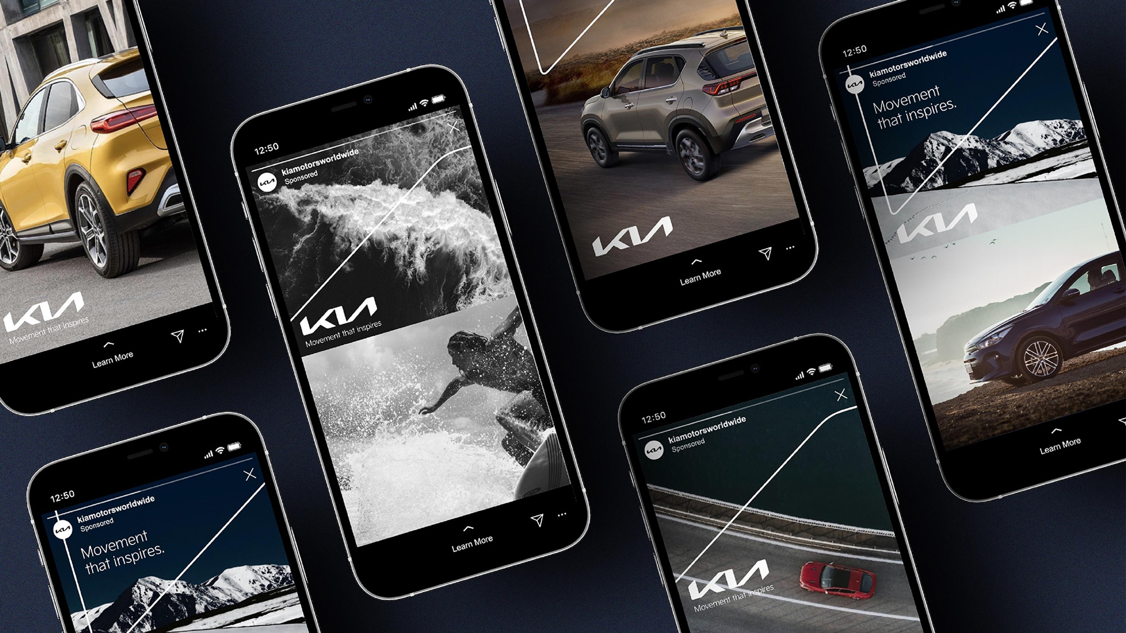 Several smartphones display Kia Motors advertisements featuring vehicles and lifestyle imagery with the tagline "Movement that inspires."